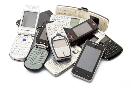 31061407 - old and obsolete cellphones on white background