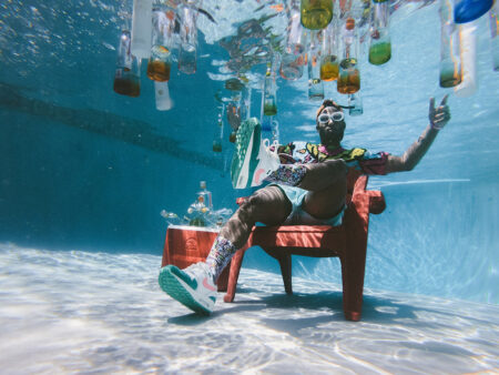 man underwater fake party