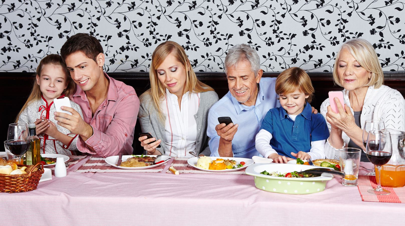 Optus Pause Family looking at Smartphone