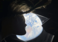 NASA astronaut Christina Koch gazes at Earth on April 2, 2026, taken with an iPhone 17 Pro Max. NASA