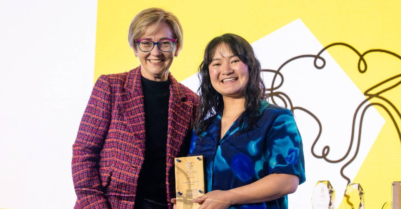 Hayley Jiang (right) with her Inspiring Student Award, alongside The Hon. Jodie Harrison MP.